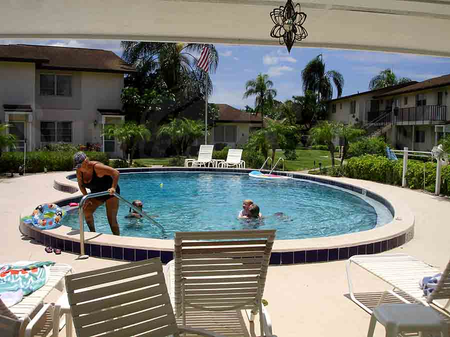 Palm Crest Villas Community Pool and Sun Deck Furnishings